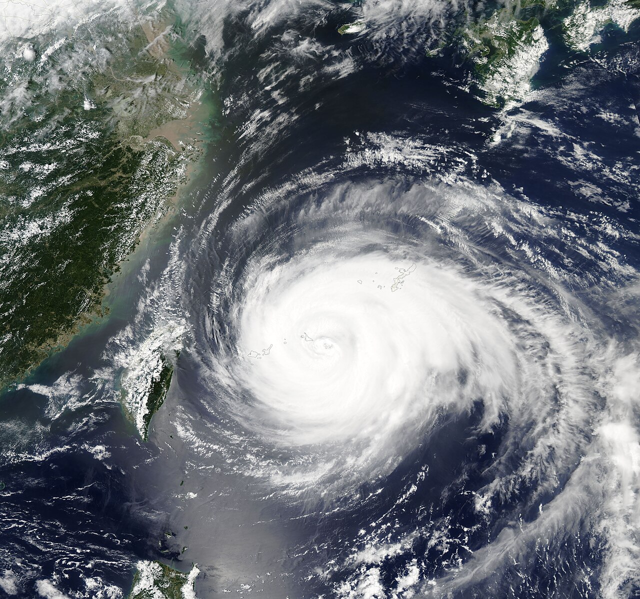 Typhoon Maria (2018) captured by satellite (MODIS), showing its spiral rainbands. The cloud bands coiling around the eye and spreading outward bring heavy rain and gusts.