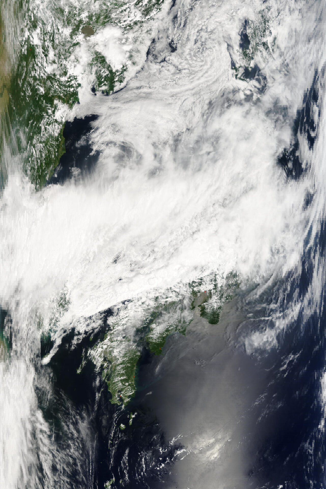 NASA's Terra satellite captures the stationary front's cloud band over Japan