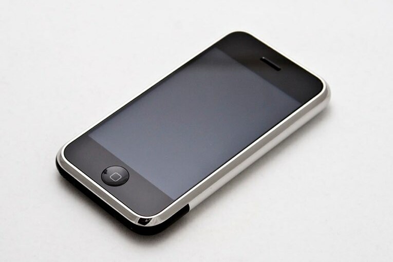 A front view of the first-generation iPhone, released in 2007. Its capacitive multitouch screen set it apart from earlier devices.