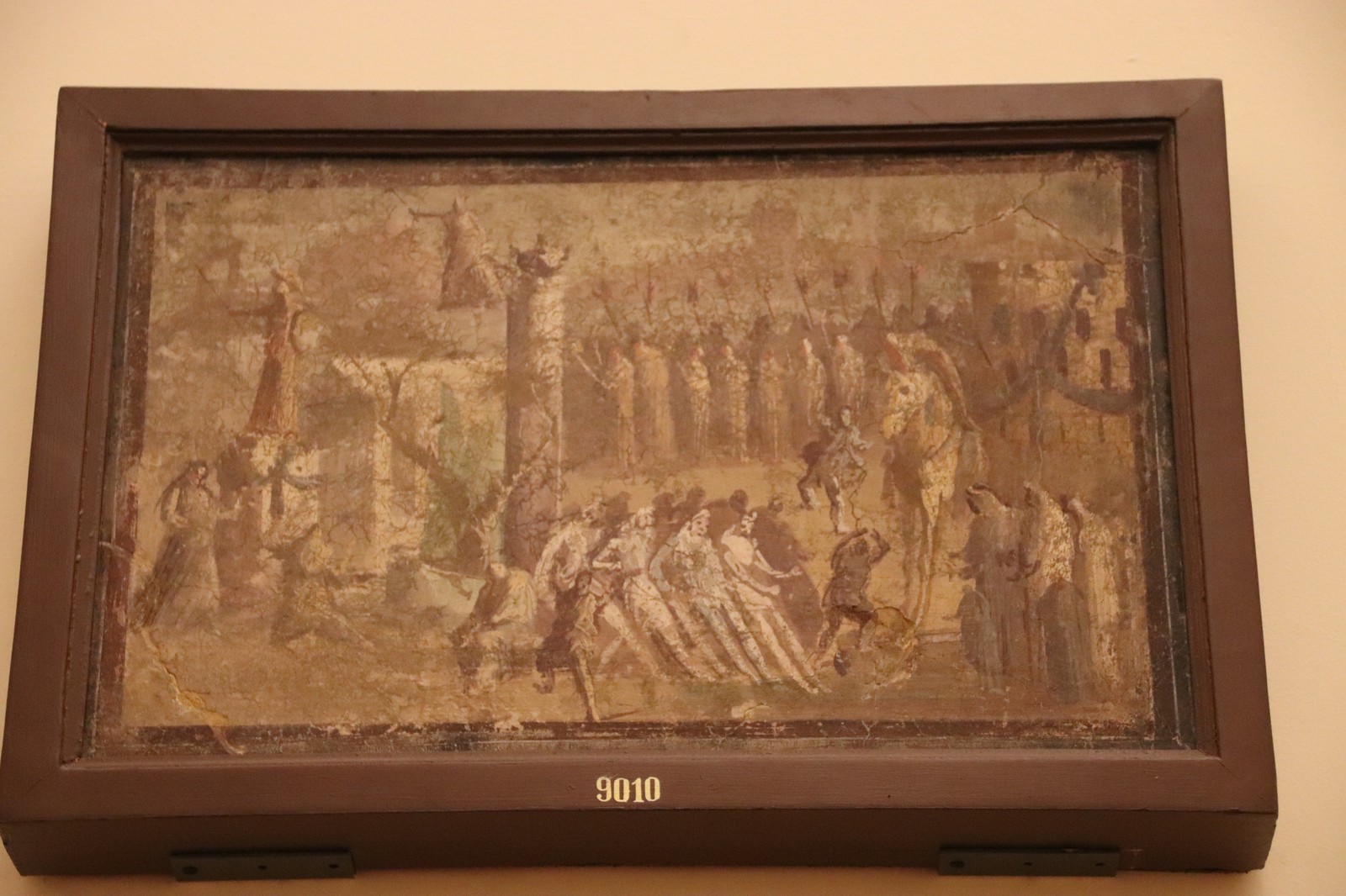 The Trojan Horse arriving at the city gates, depicted in a Pompeii wall painting